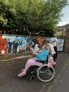 Castlegreen care home resident Mary unveils new mural